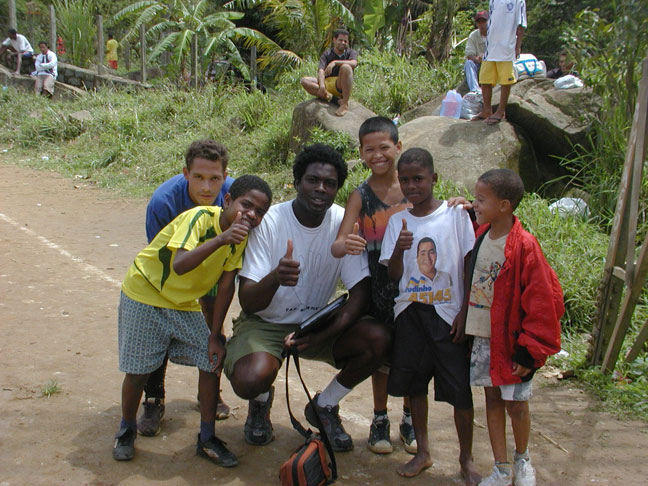 Joseph Renwick Randon with children in Brazil during the New Millennium Mission Tour