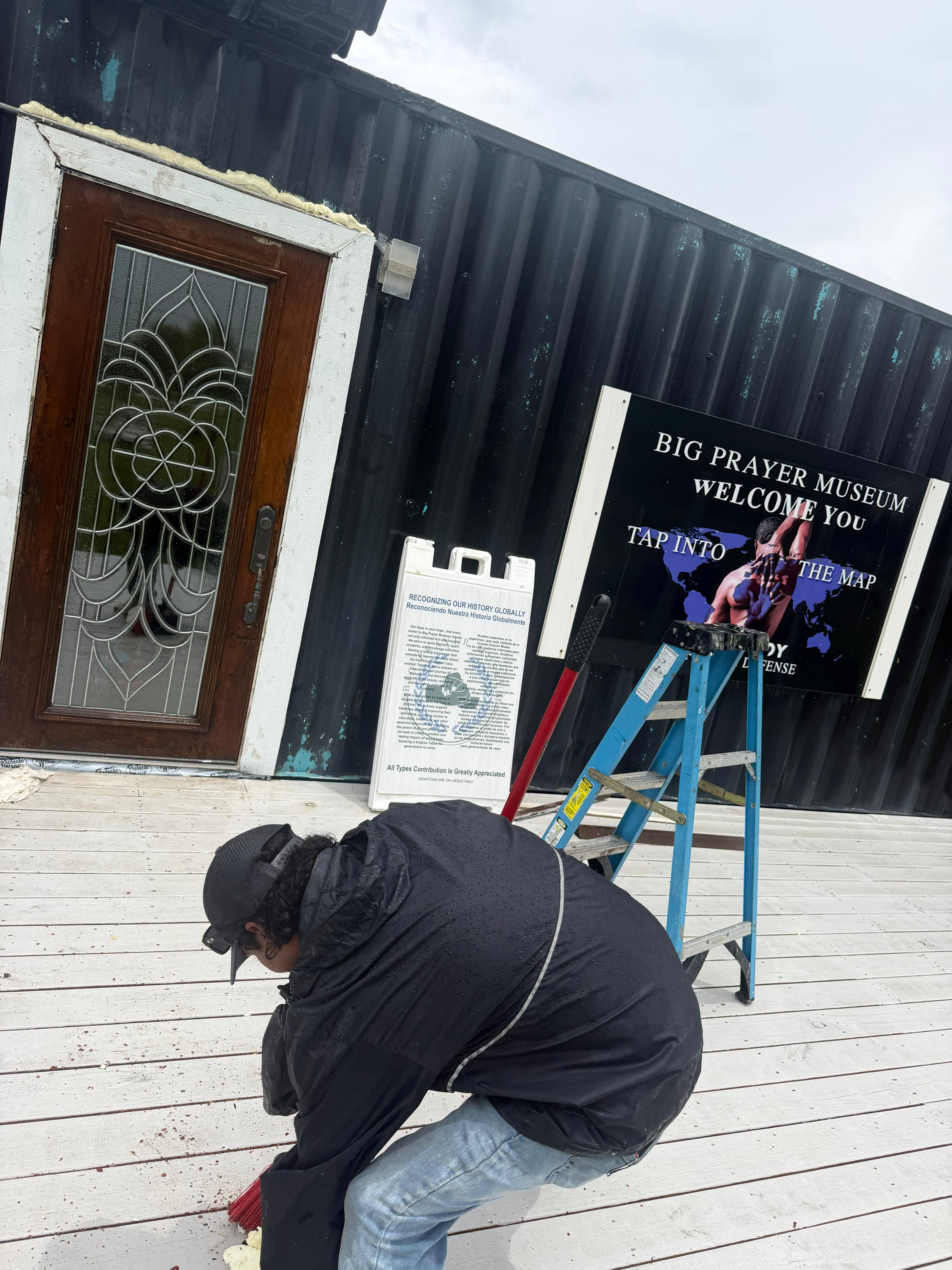 Javier working inside Big Prayer Museum
