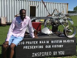 Joseph Renwick Randon with Big Prayer Museum historical objects